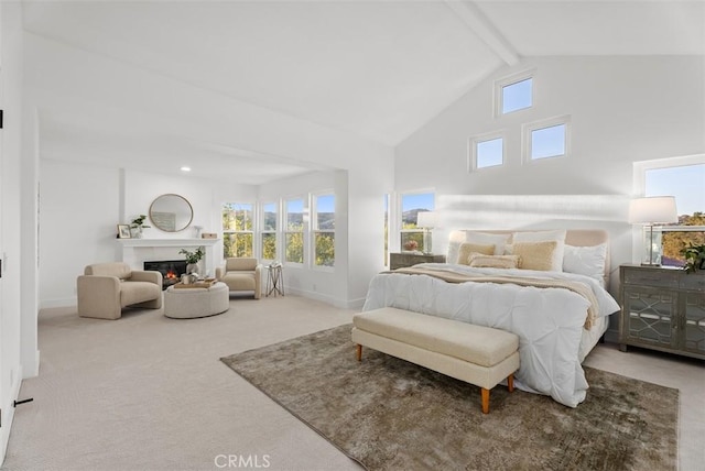 bedroom featuring beamed ceiling, carpet floors, and high vaulted ceiling