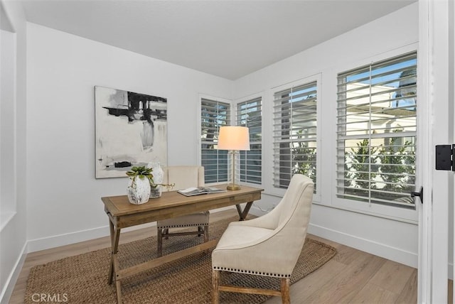 office area with hardwood / wood-style flooring