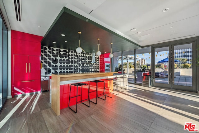 bar with floor to ceiling windows