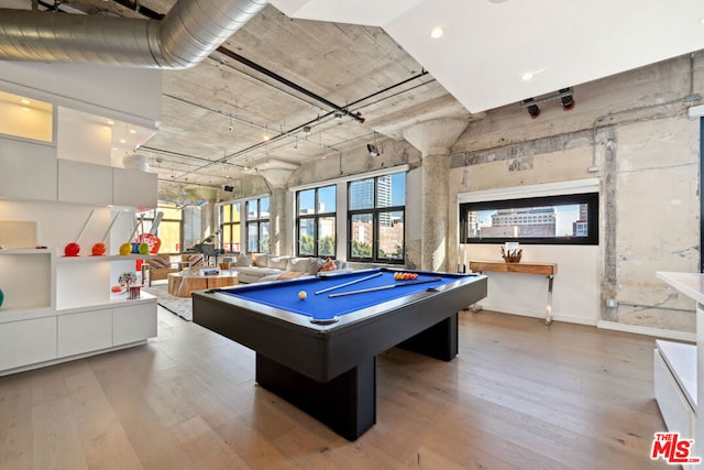 game room featuring pool table and light hardwood / wood-style floors