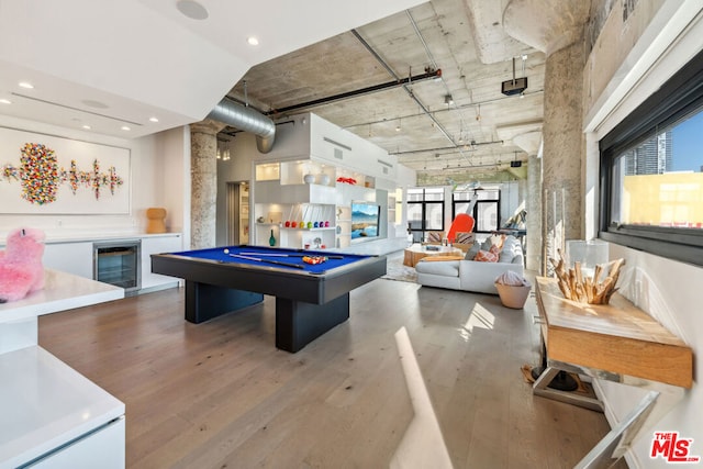 game room with wine cooler, pool table, and hardwood / wood-style flooring