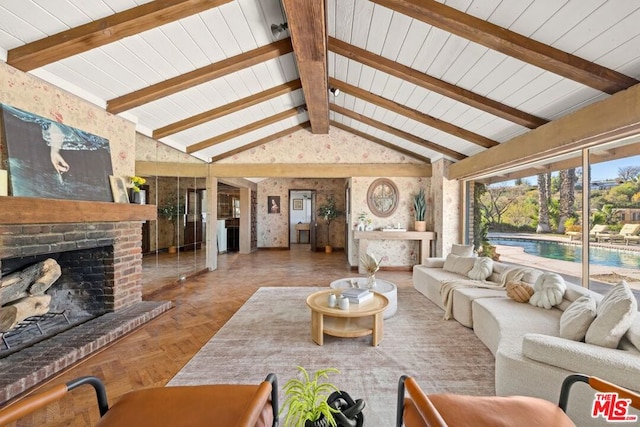 living room featuring parquet floors, a fireplace, beam ceiling, and high vaulted ceiling