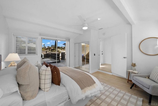 bedroom with beamed ceiling, access to exterior, ceiling fan, and light hardwood / wood-style flooring