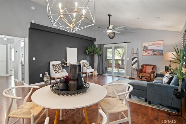 dining room with lofted ceiling, dark wood-type flooring, and ceiling fan