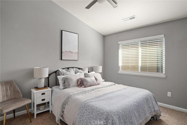 carpeted bedroom featuring lofted ceiling and ceiling fan