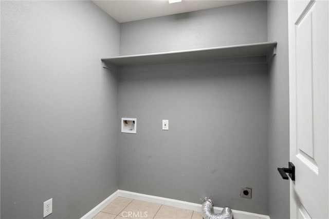 washroom featuring washer hookup, light tile patterned floors, and hookup for an electric dryer