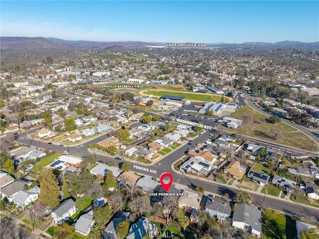 drone / aerial view featuring a mountain view