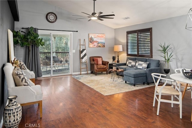 living room with lofted ceiling, hardwood / wood-style floors, and ceiling fan