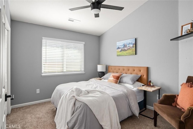 carpeted bedroom featuring lofted ceiling and ceiling fan