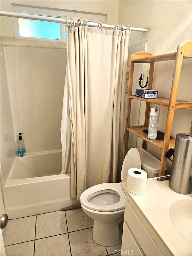 full bathroom with shower / tub combo with curtain, vanity, toilet, and tile patterned flooring