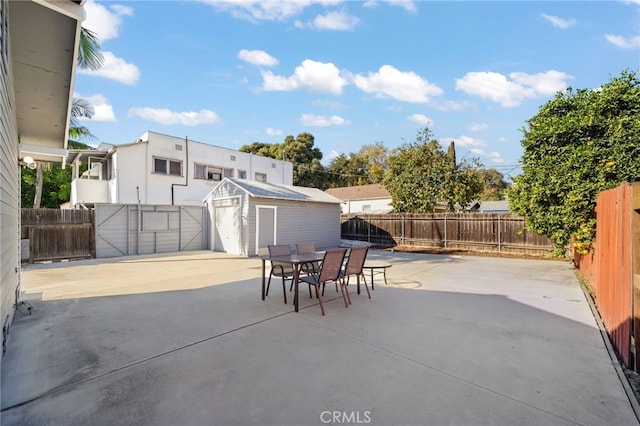 view of patio / terrace featuring a shed