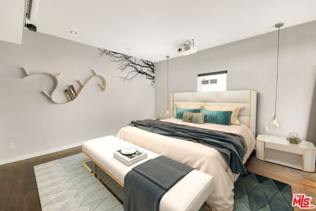 bedroom featuring wood-type flooring