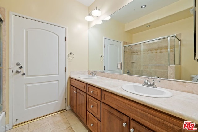 bathroom featuring vanity and tile patterned floors