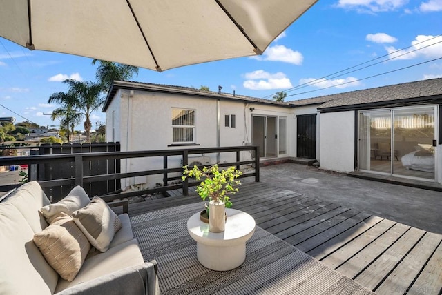 wooden deck featuring an outdoor hangout area