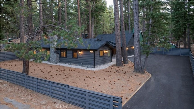 view of side of property with a garage