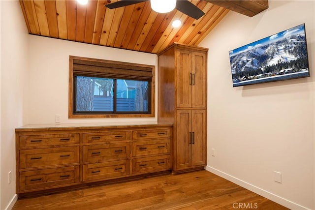 interior space featuring lofted ceiling, wood ceiling, light hardwood / wood-style flooring, and ceiling fan