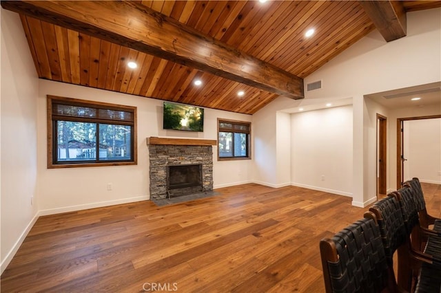 unfurnished living room with wood ceiling, wood-type flooring, a fireplace, and lofted ceiling with beams