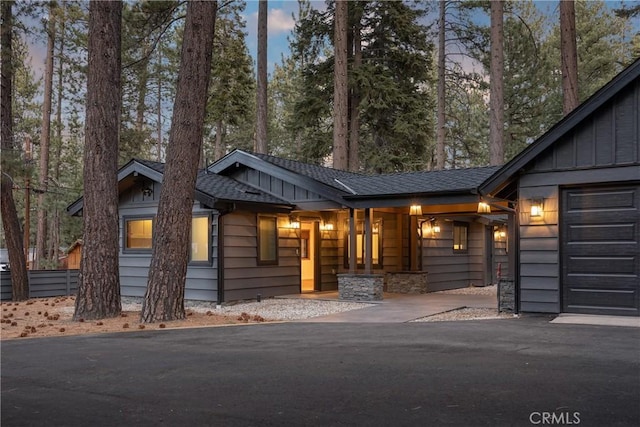 view of front of property with a garage