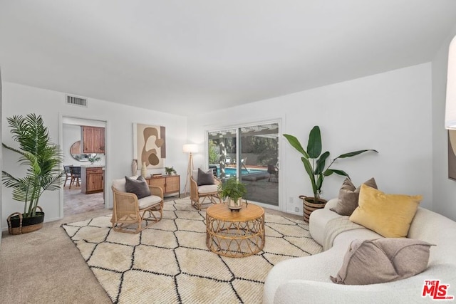 living room with light carpet