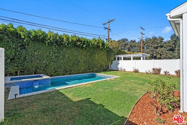 view of yard featuring a swimming pool with hot tub