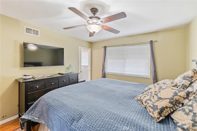 bedroom featuring ceiling fan and light hardwood / wood-style floors