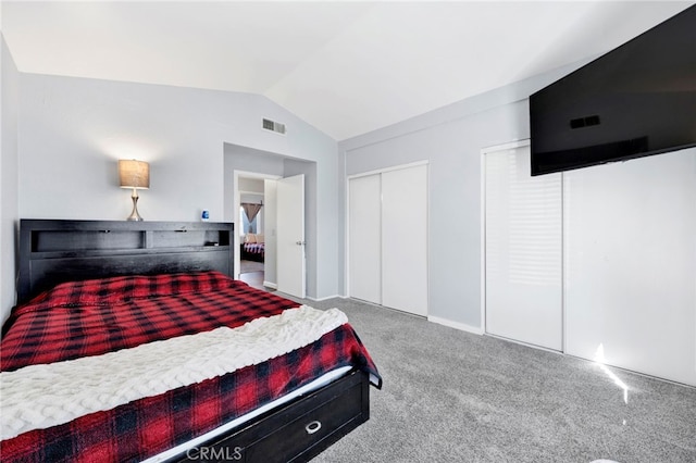 bedroom featuring vaulted ceiling and light carpet