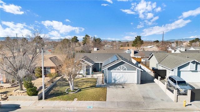 ranch-style home with a garage