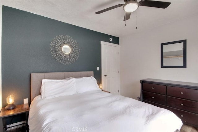 bedroom featuring ceiling fan