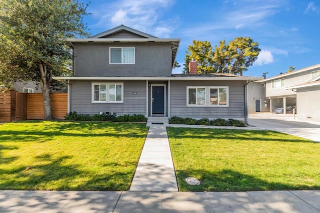 front of property with a front lawn