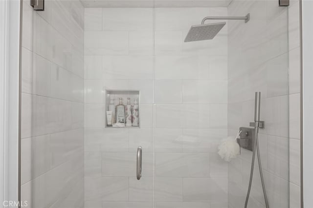 details with an enclosed shower