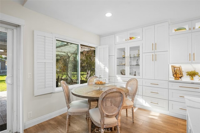 dining room featuring light hardwood / wood-style flooring