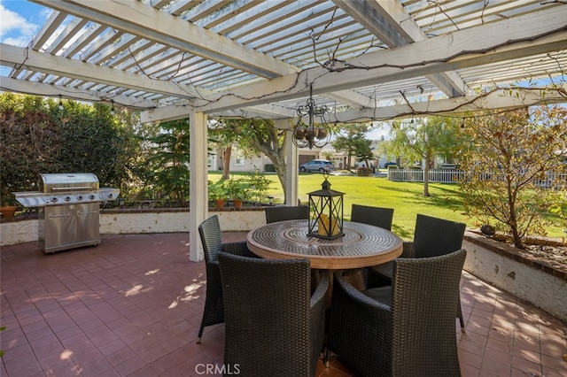 view of patio with a grill and a pergola