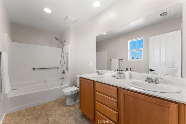 full bathroom with vanity, shower / bathtub combination, and toilet