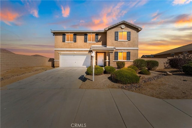 view of property featuring a garage