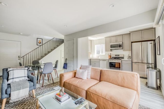 living room with light hardwood / wood-style floors