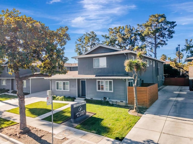 front of property with a front yard