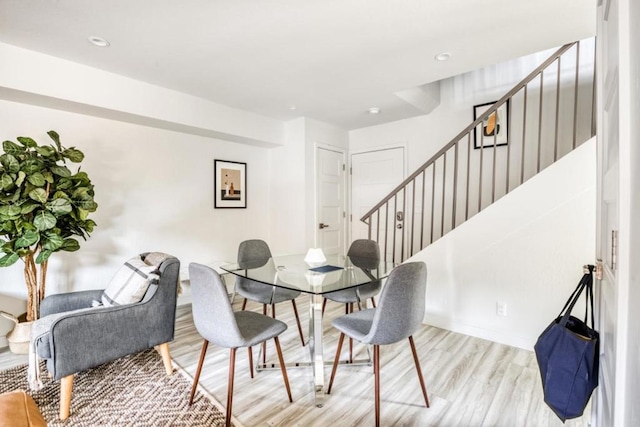 dining space featuring light hardwood / wood-style flooring