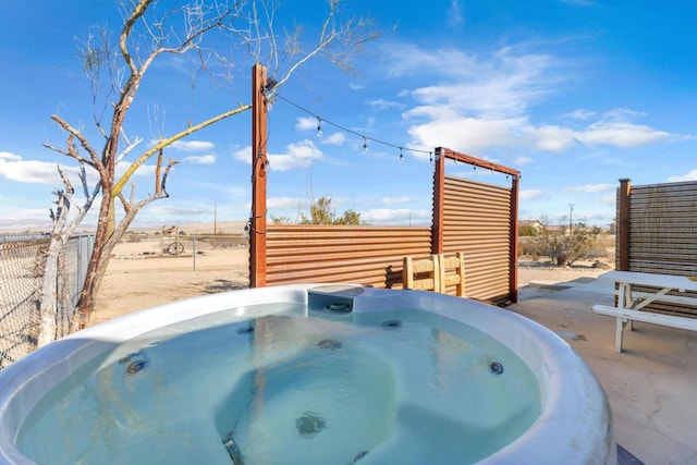 view of patio featuring a hot tub