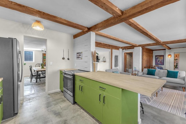 kitchen featuring a breakfast bar area, appliances with stainless steel finishes, kitchen peninsula, green cabinets, and beamed ceiling