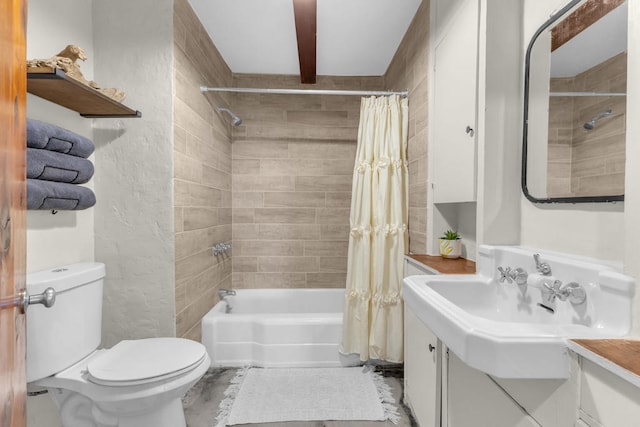 full bathroom featuring vanity, toilet, and shower / tub combo