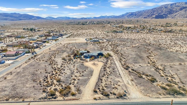 bird's eye view with a mountain view