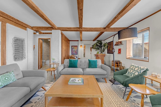 living room with beam ceiling