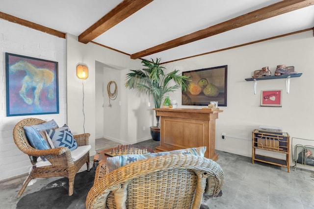 living area featuring beam ceiling