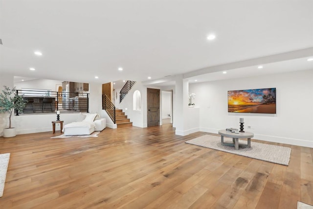 unfurnished living room with light wood-type flooring