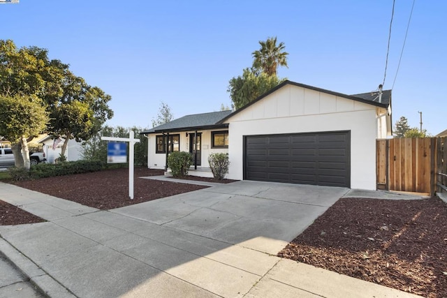 single story home featuring a garage