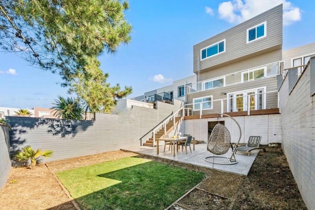 rear view of property with a patio area