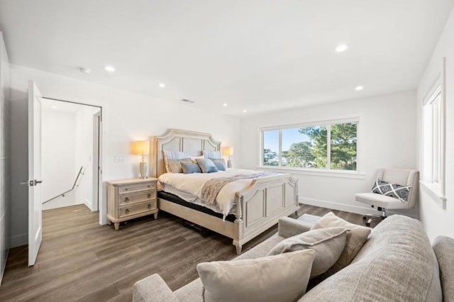 bedroom with hardwood / wood-style floors