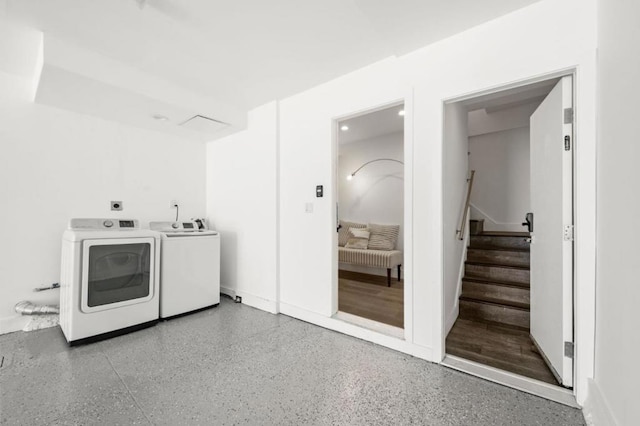 laundry area with washer and clothes dryer