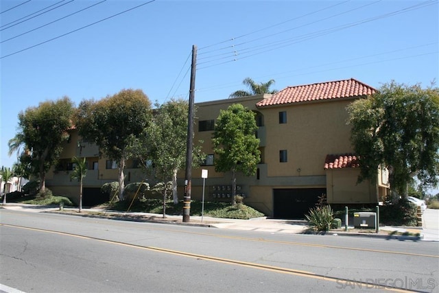 view of property featuring a garage