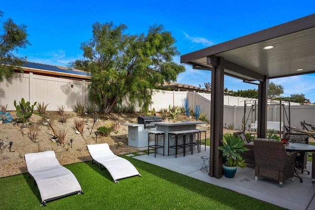 view of yard with a bar and a patio area